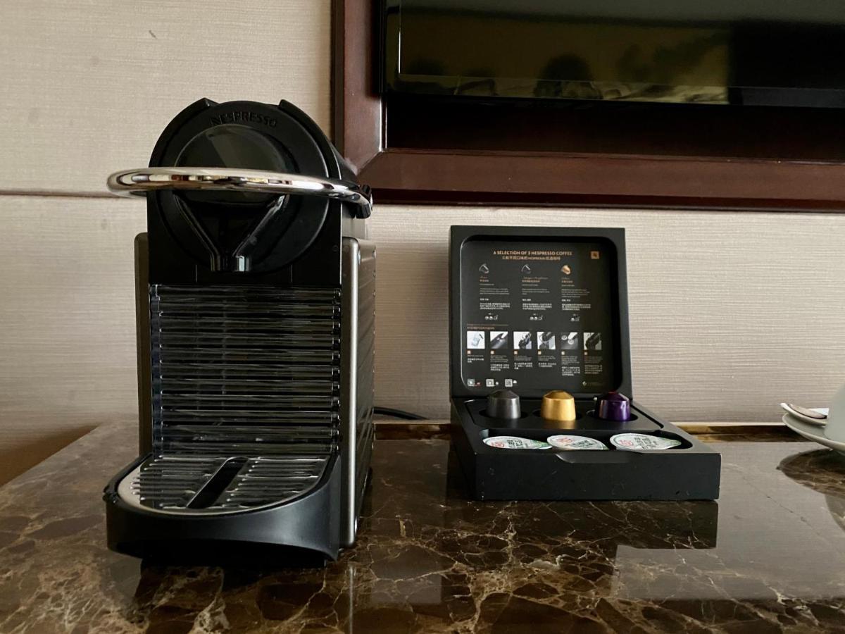 Suite Executive con cama extragrande y acceso al club