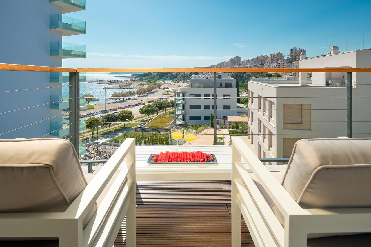 One-bedroom apartment balcony partial sea view