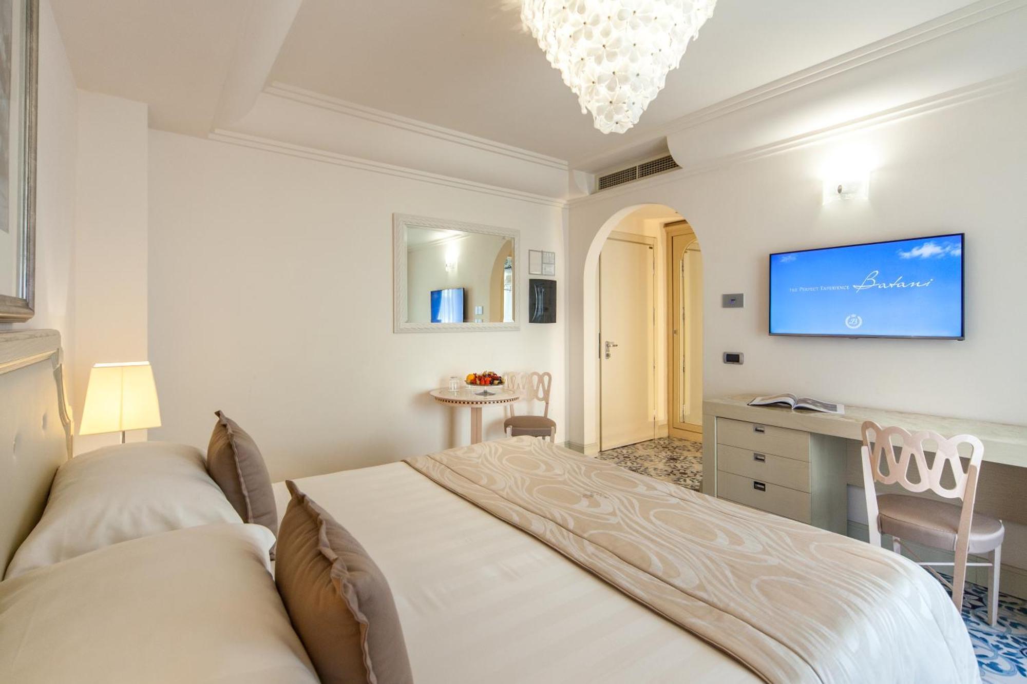 Zimmer mit Queensize-Bett und Gartenblick
