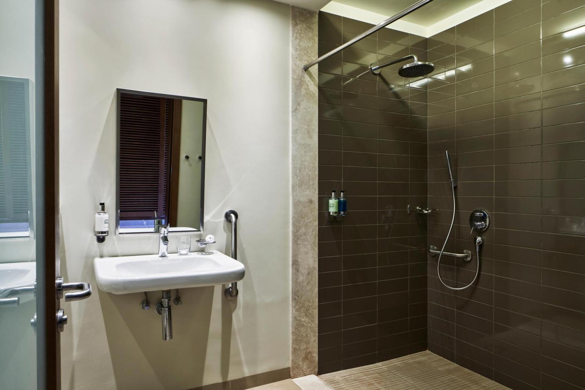Deluxe Zimmer für besondere Anforderungen mit 2 Einzelbetten und Zugang zum Aquapark