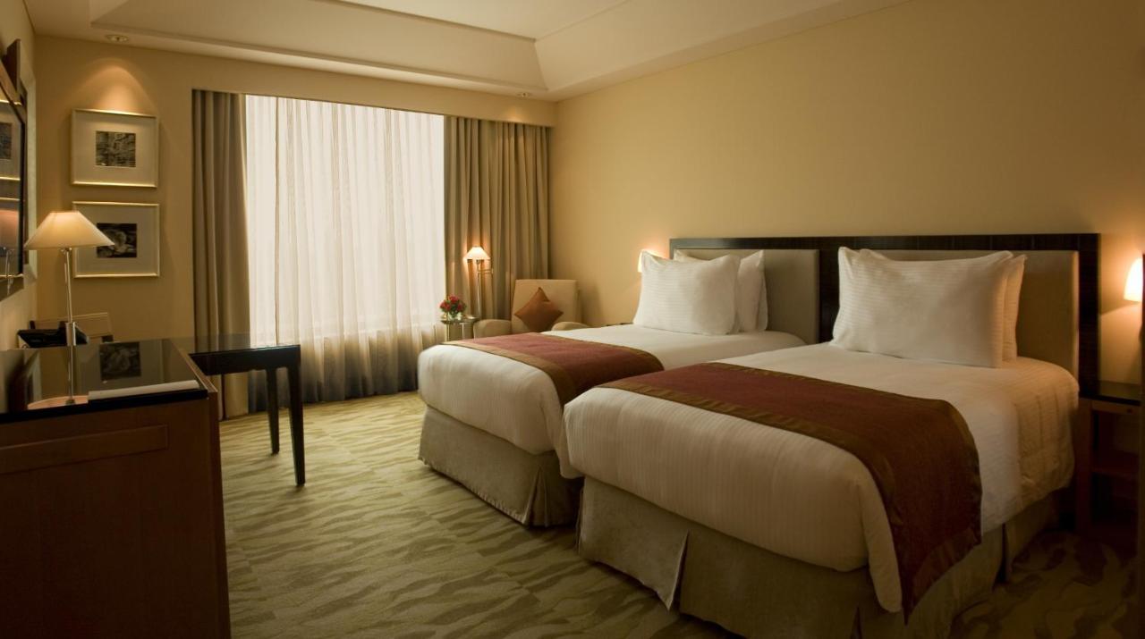The Grand Deluxe Room Twin Bed on session of 30 mins Spa on food & soft beverage services on Laundry service T&C applicable
