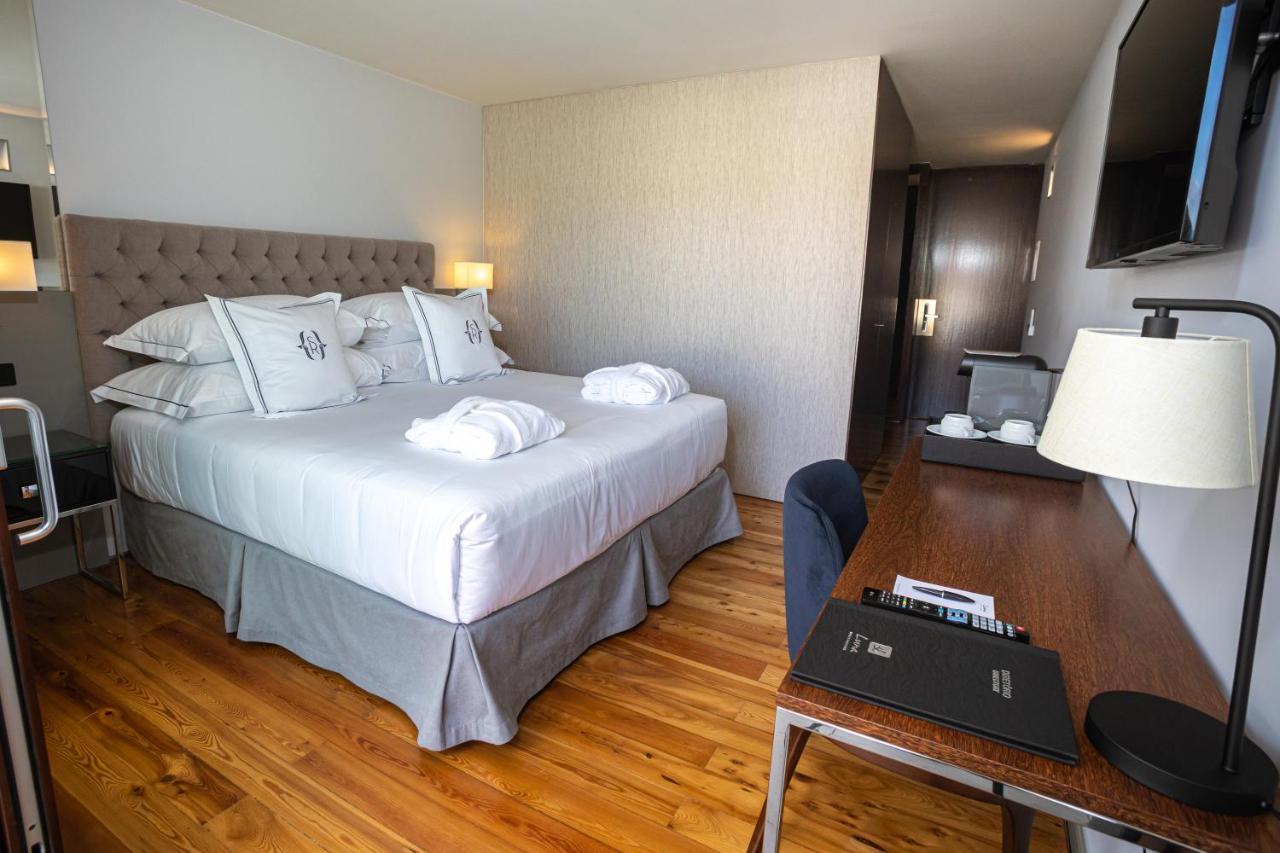 Quarto Duplo ou Twin Clássico Terraço - Edifício Moderno