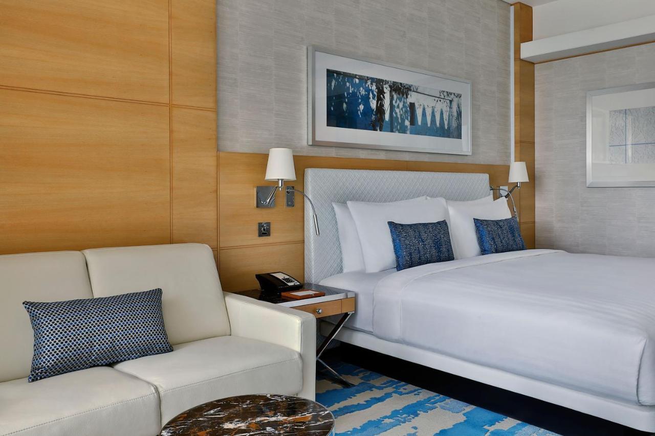 Palm Deluxe Room 1 King Bed Sofa bed Private Balcony Beachfront Resort