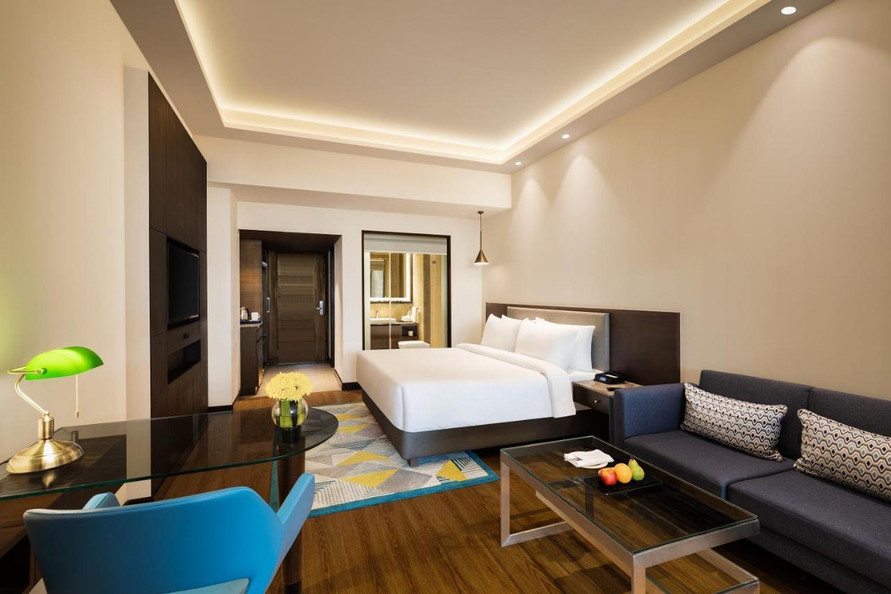 Standard Room Enjoy Happy Hours 11 on Beverages 12 PM-6 PM Except Dragon House on Spa Laundry service INR 500 credit on buffet at Mosaic Restaurant