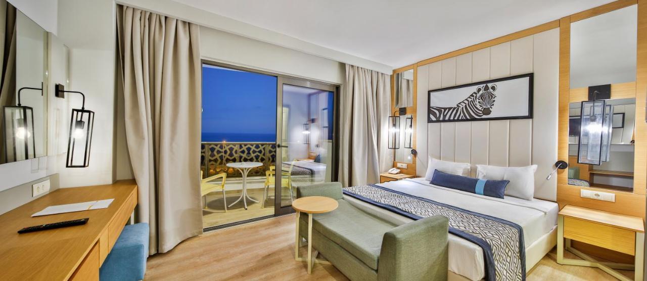 Double or Twin Room with Side Sea View,1380125300:JPEG