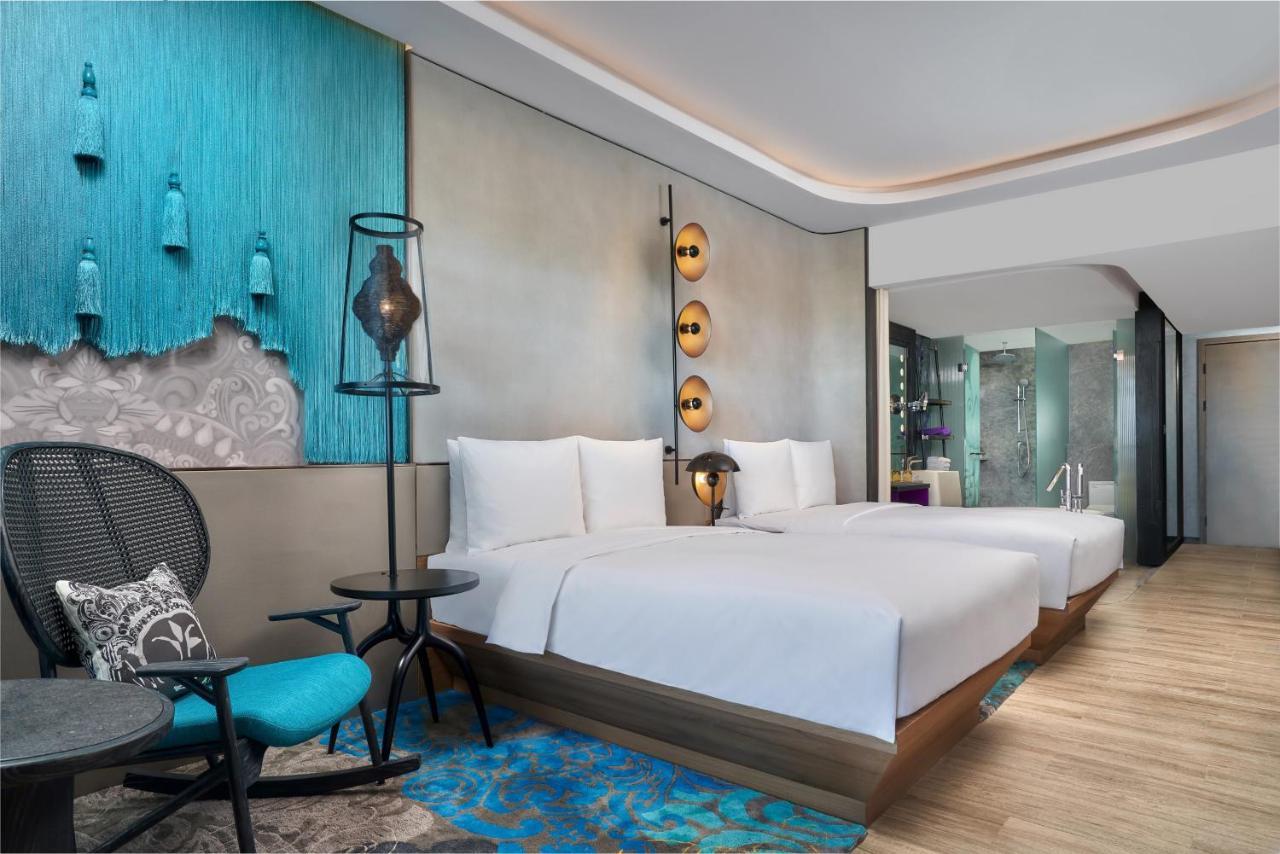 Deluxe Twin Guest room 2 Double Balcony Scheduled Shuttle to Hotel’s Beach Facility ,1617885723:JPEG