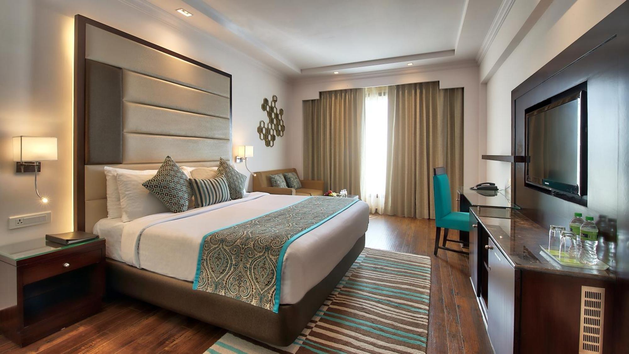 Double Room Enjoy INR 500 credit on buffet at Mosaic Restaurant Happy Hours 11 on Alcoholic Beverages 12 PM-6 PM Soft Beverages Except Dragon House 2 pints of House Beer per room once during Laundry Spa