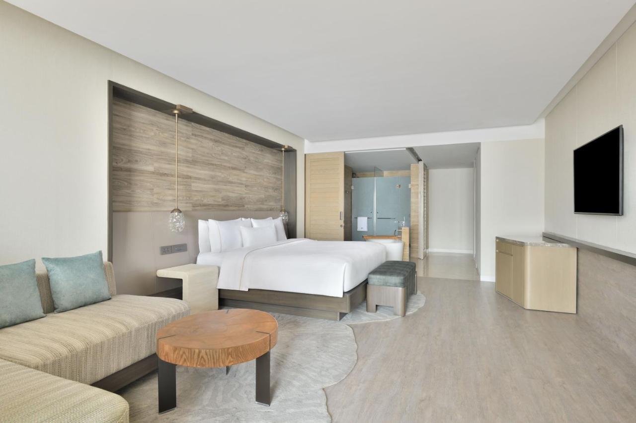 Deluxe King Room Balcony Skyline View | INR 1000 wellness credit per non-cumulative redeemable against Spa therapy or at Hakuna Matata the gaming zone
