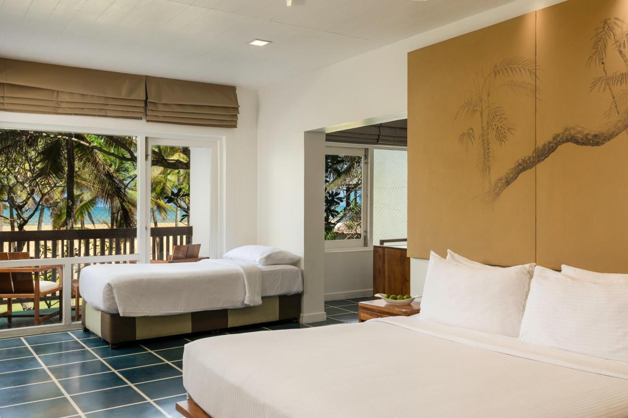 Family Room Sea View at Center Point Black Coral & at Seaside Social restaurants