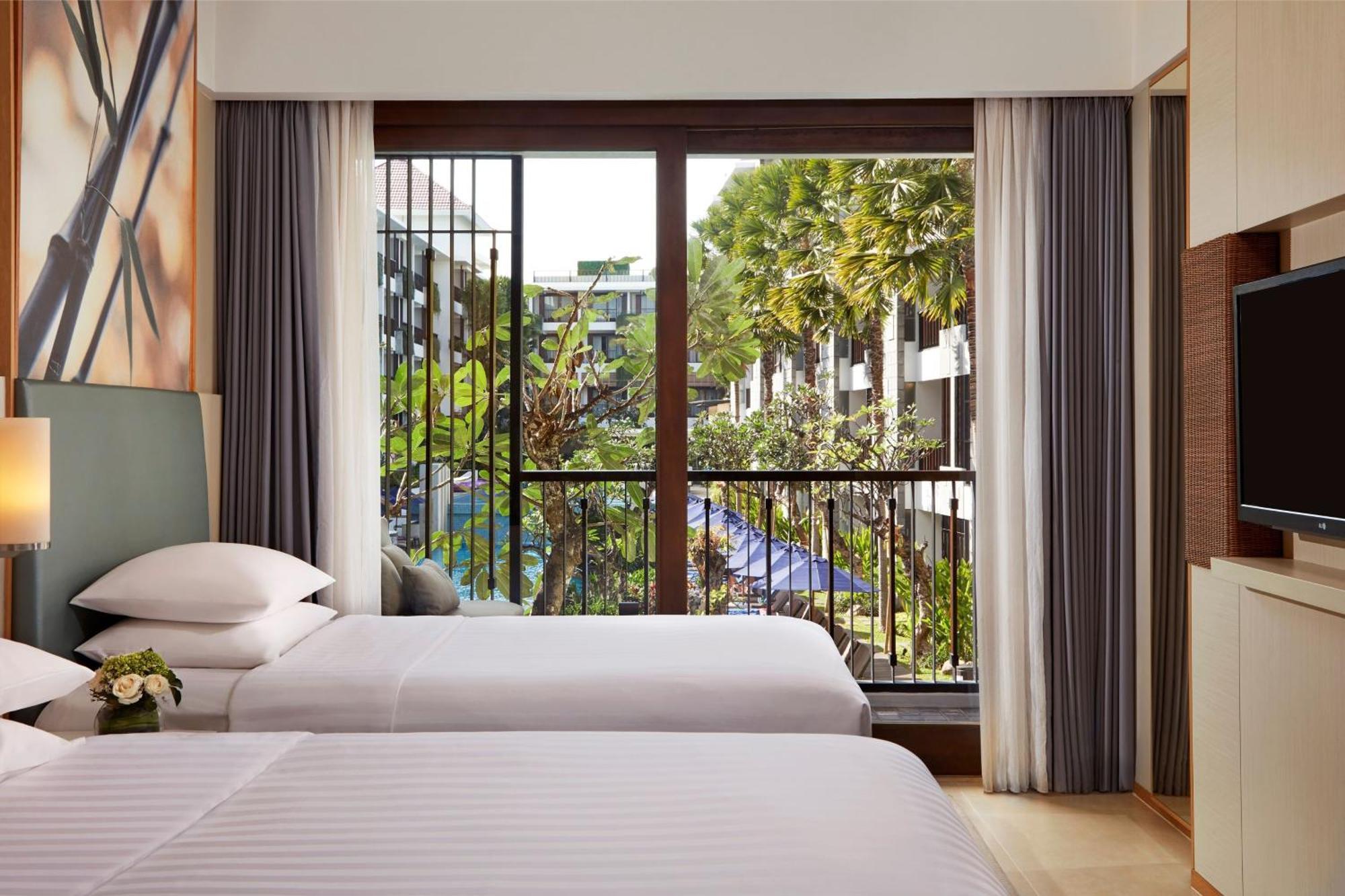 Deluxe Zweibettzimmer mit Poolblick