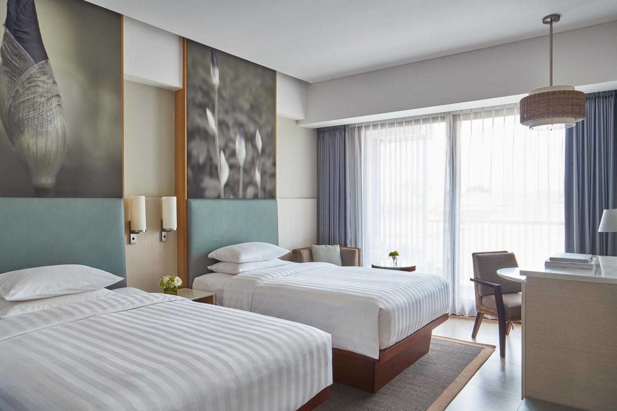 Deluxe Zweibettzimmer mit Balkon und Stadtblick