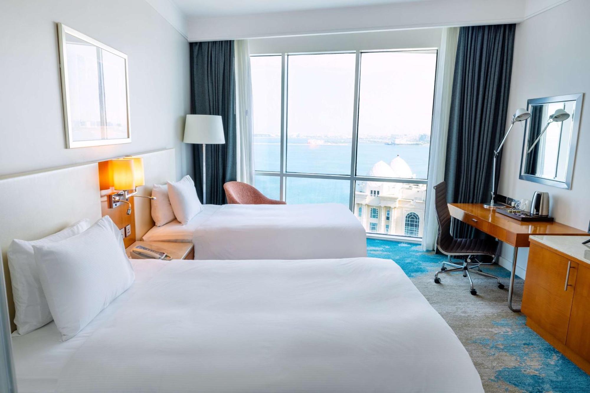 Zweibettzimmer mit Meerblick