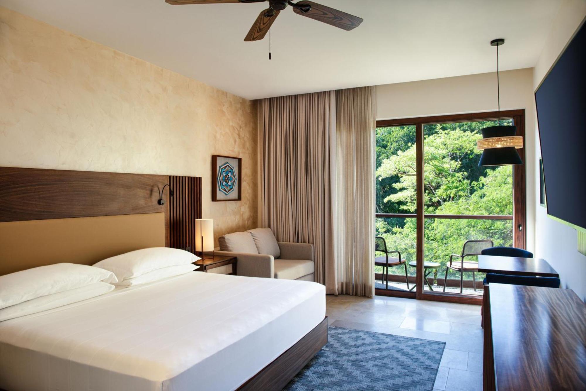 Deluxe, All-Inclusive, Guest room, 1 King, Sofa bed, Balcony