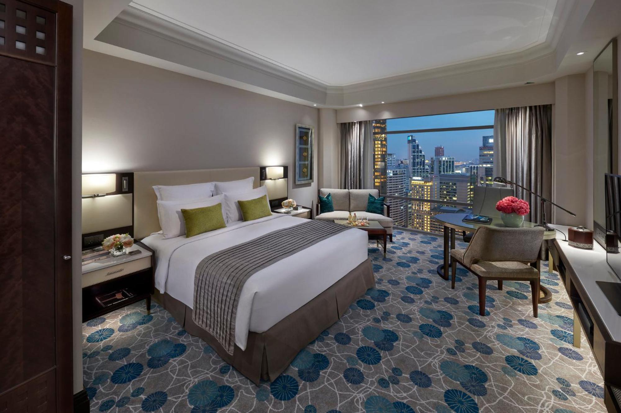 Deluxe Zimmer mit Kingsize-Bett und Stadtblick