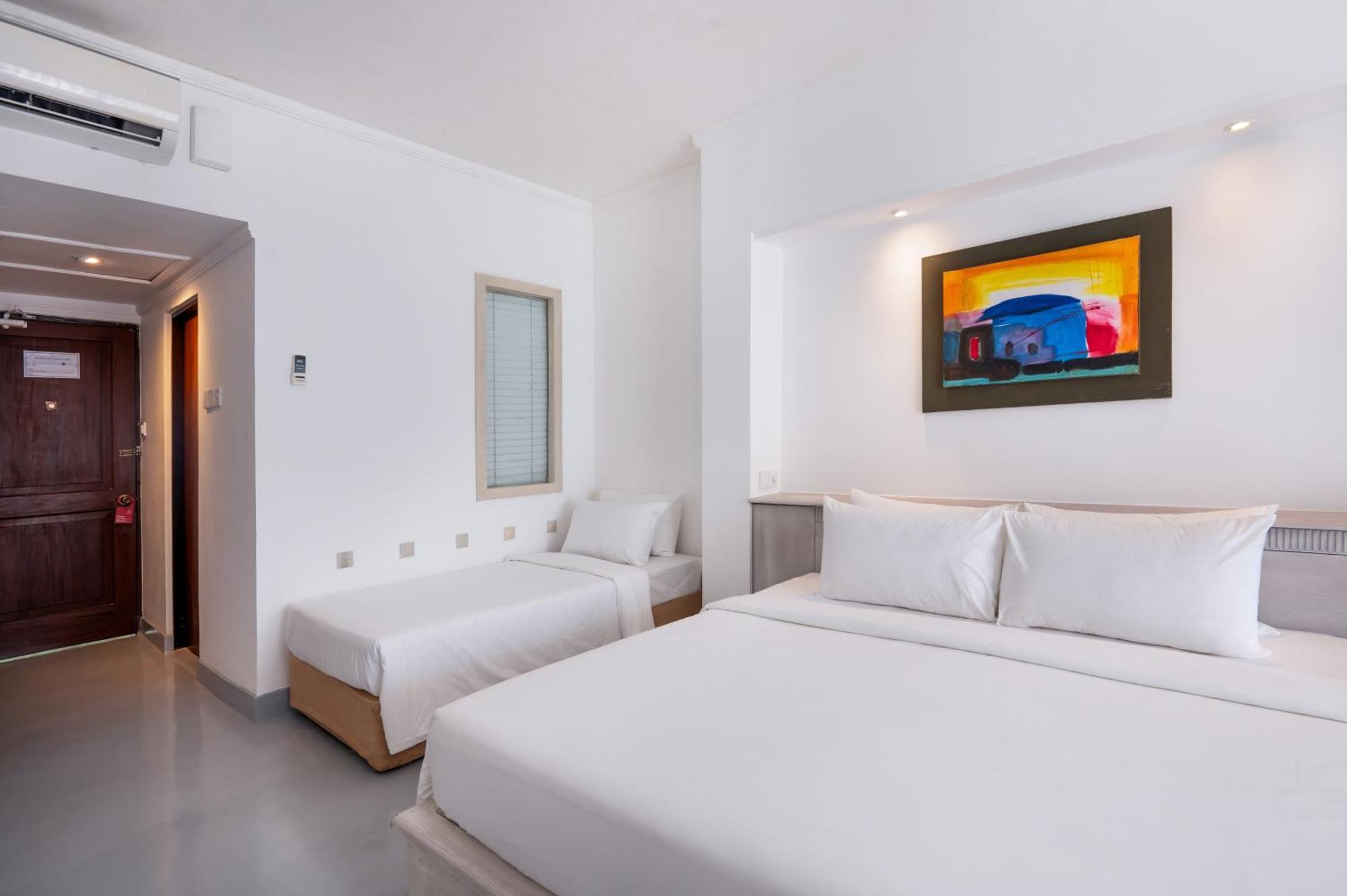 Deluxe Dreibettzimmer