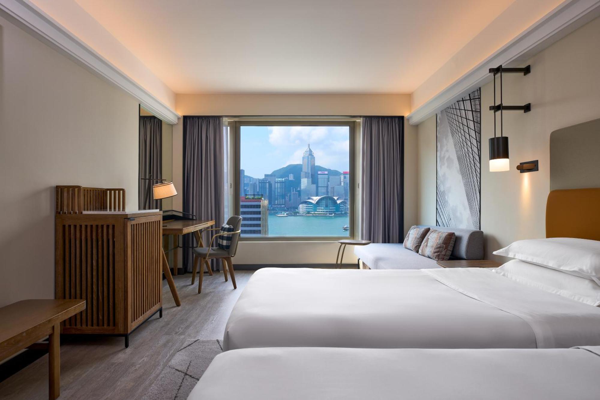 Großes Zweibettzimmer mit Hafenblick