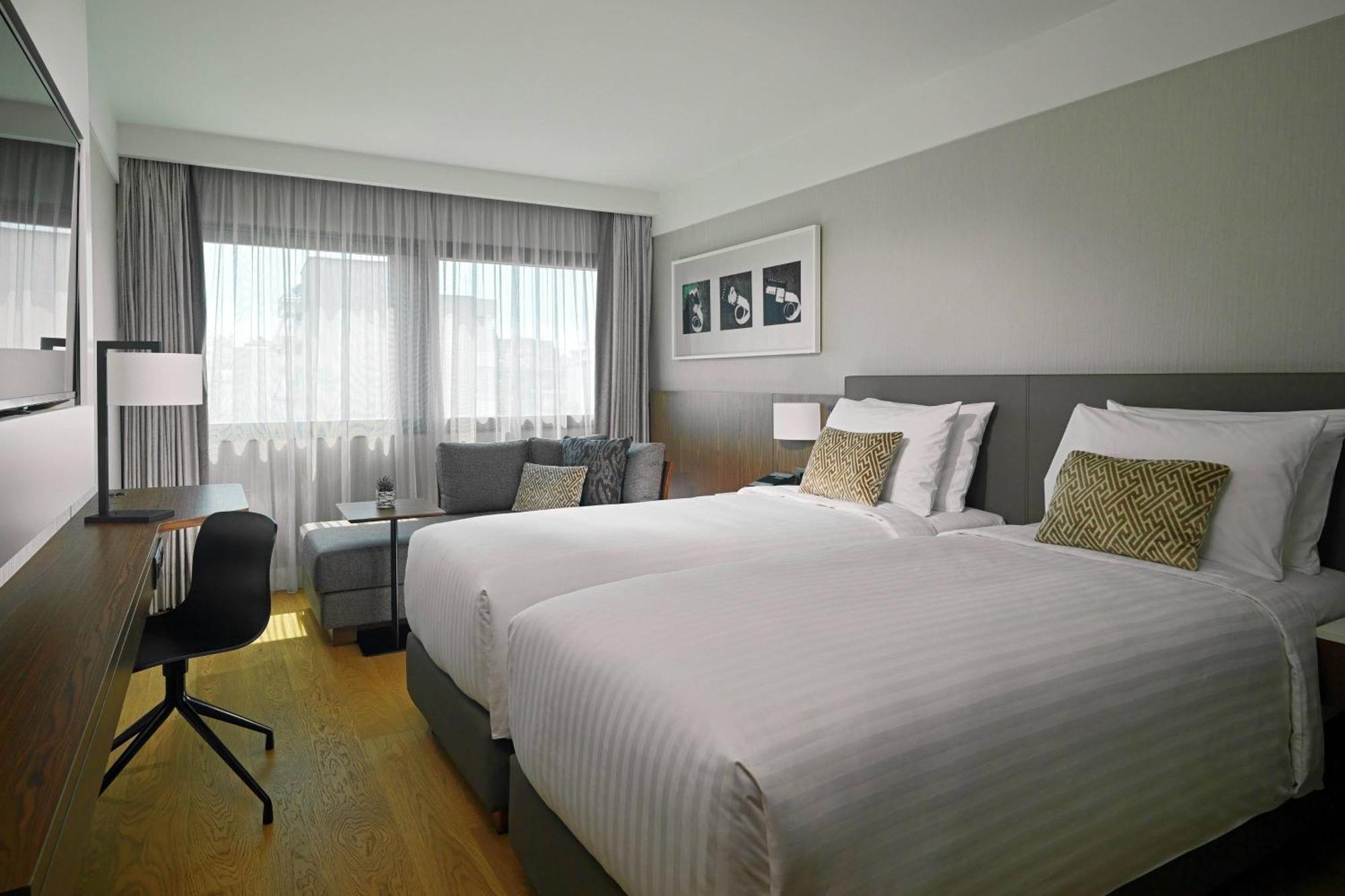 Superior Guest Room Two Single Beds Courtyard View