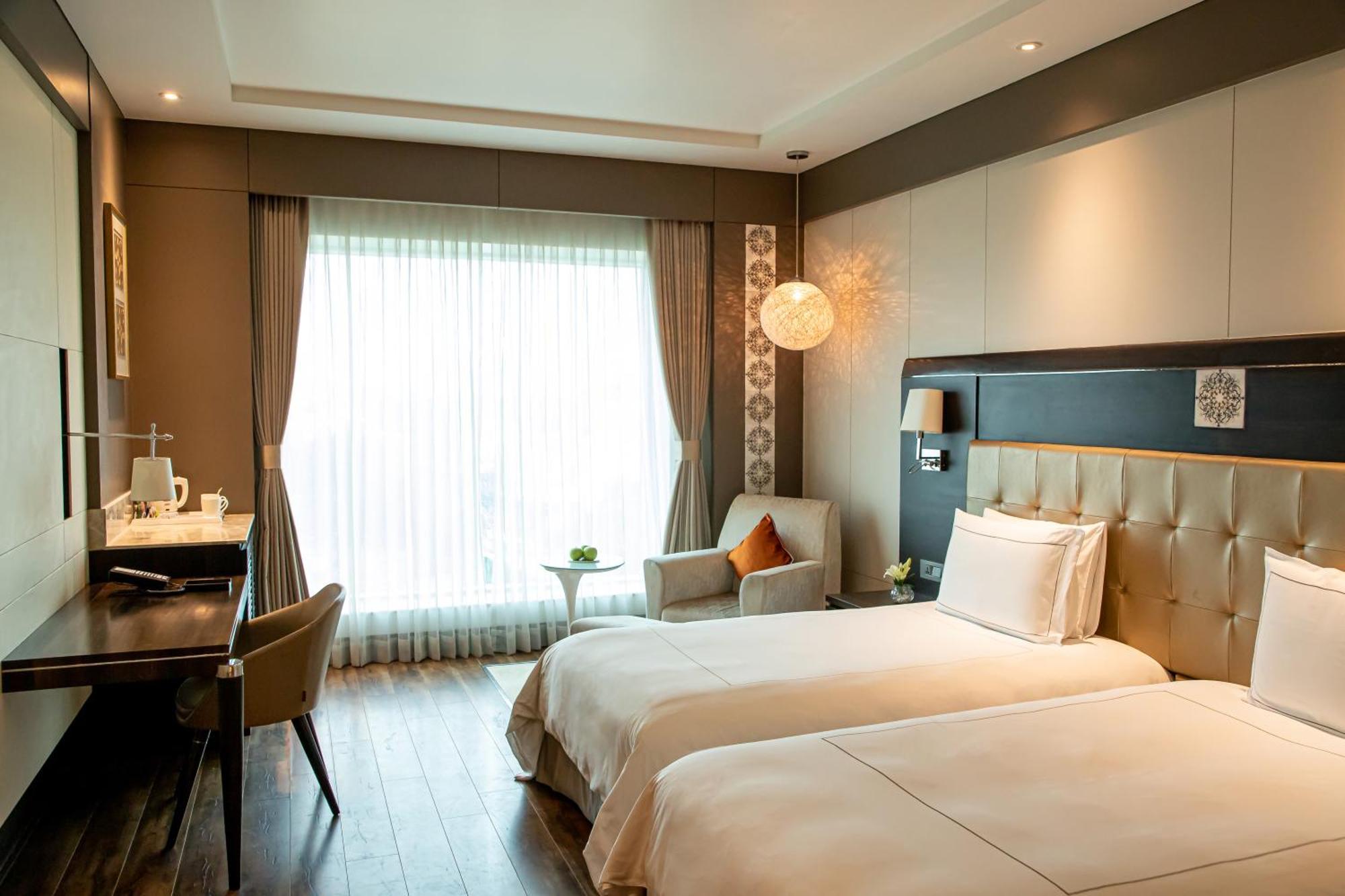 Deluxe Room Twin Bed on food beverages laundry spa