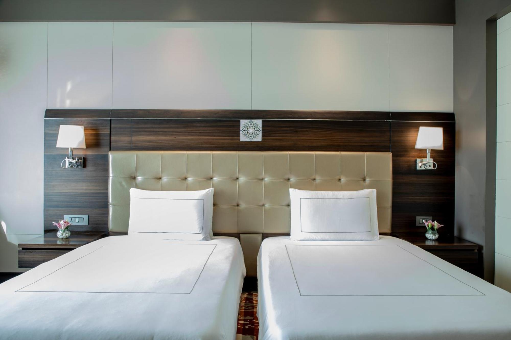 Deluxe Room Twin Bed on food beverages laundry spa