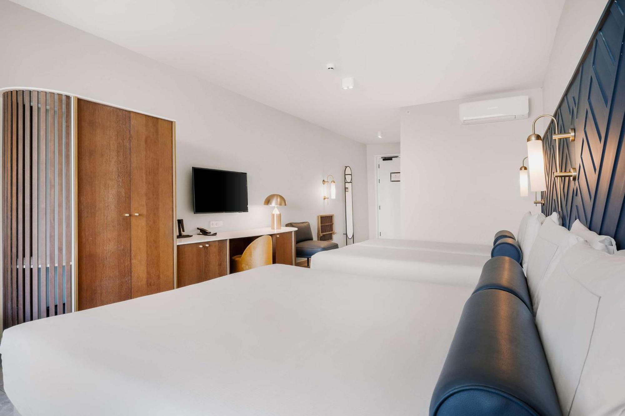 Zimmer mit 2 Kingsize-Betten