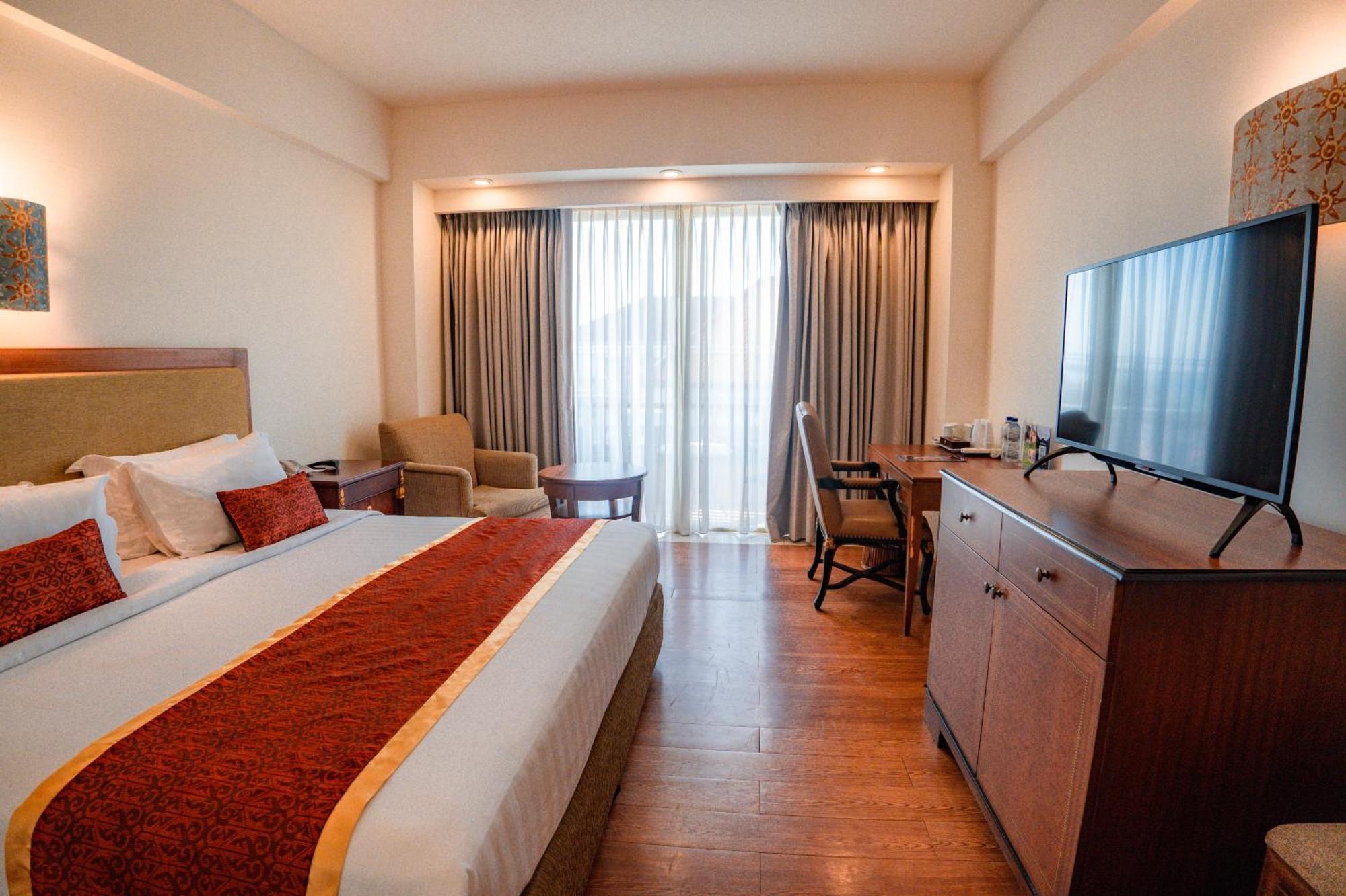 Deluxe Double or Twin Room Airport Transfer
