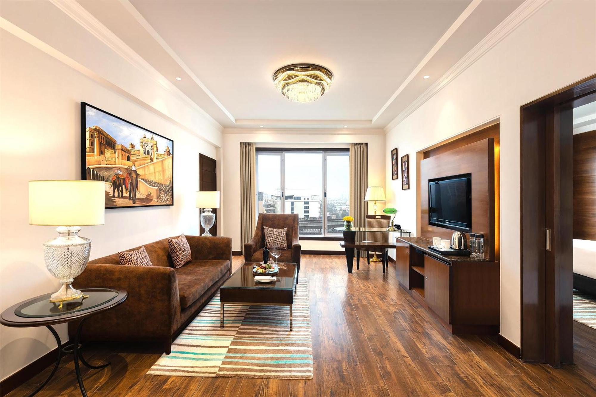 Suite 2 Way Airport Transfer on SPA 4pcs of Laundry or room or nightIINR 2000 F&B creditDaily Fruit basket 1 bottle of whiskey or as per availability Dragon If all meals room is booked Sightseeing transport services Lounge Ac