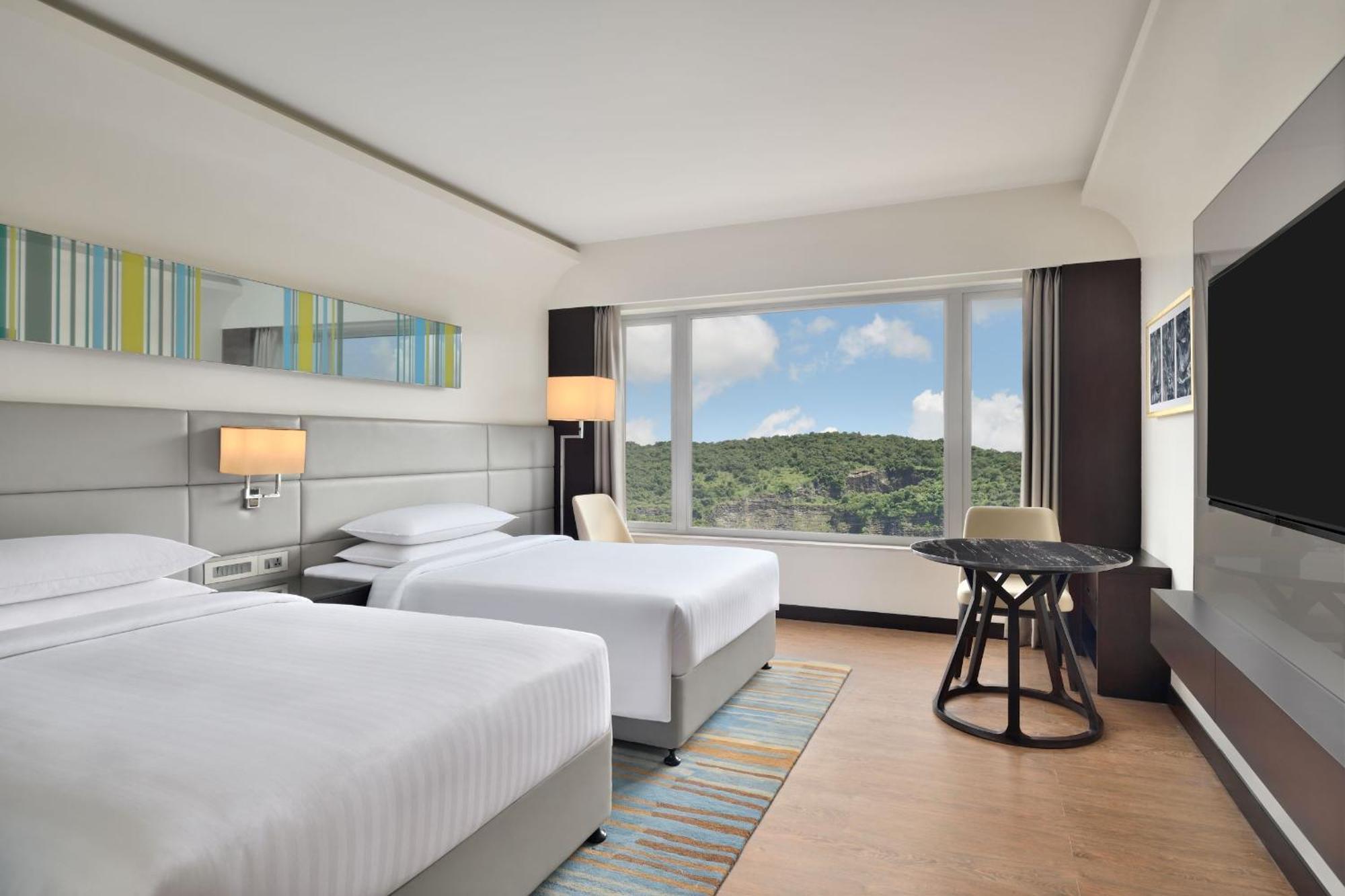 Guest room 2 Twin Hill view on food soft beverages