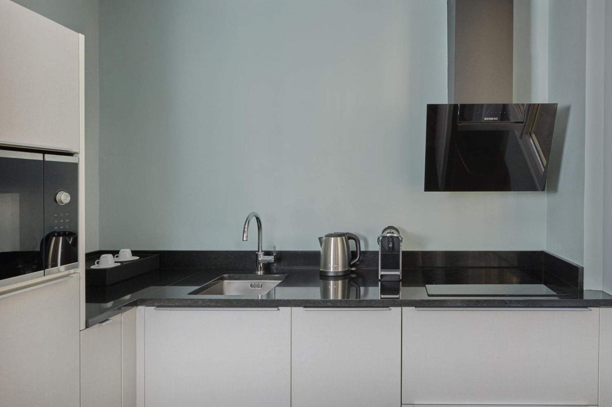 Two-Bedroom Deluxe Suite with Patio View,1682929751:JPEG