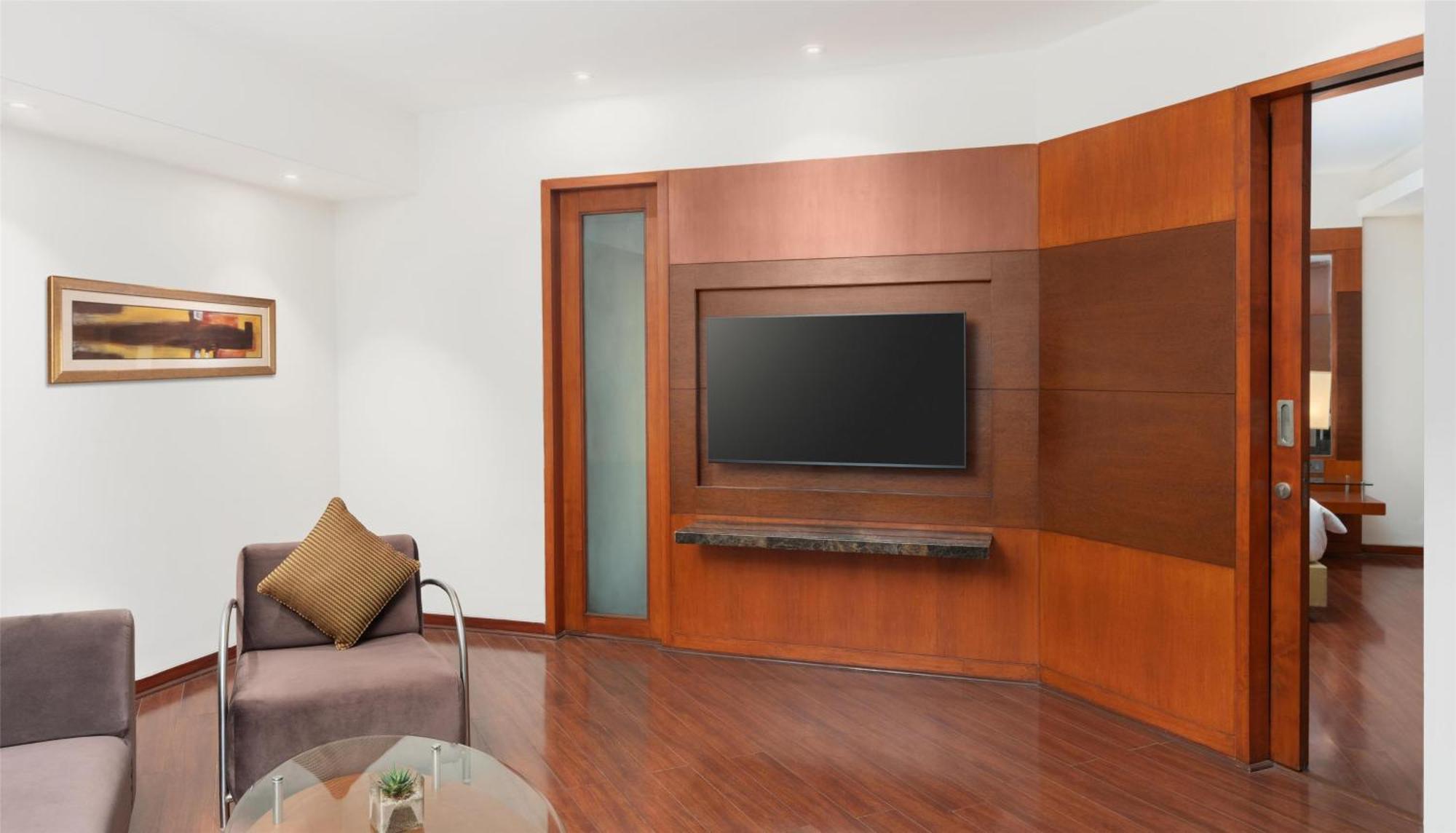 Deluxe Suite Happy Hours 0100 PM to 0600 PM 11 Airport Transfers on Food & Beverage Pick up drop to Worldmark Aerocity subject to car availability