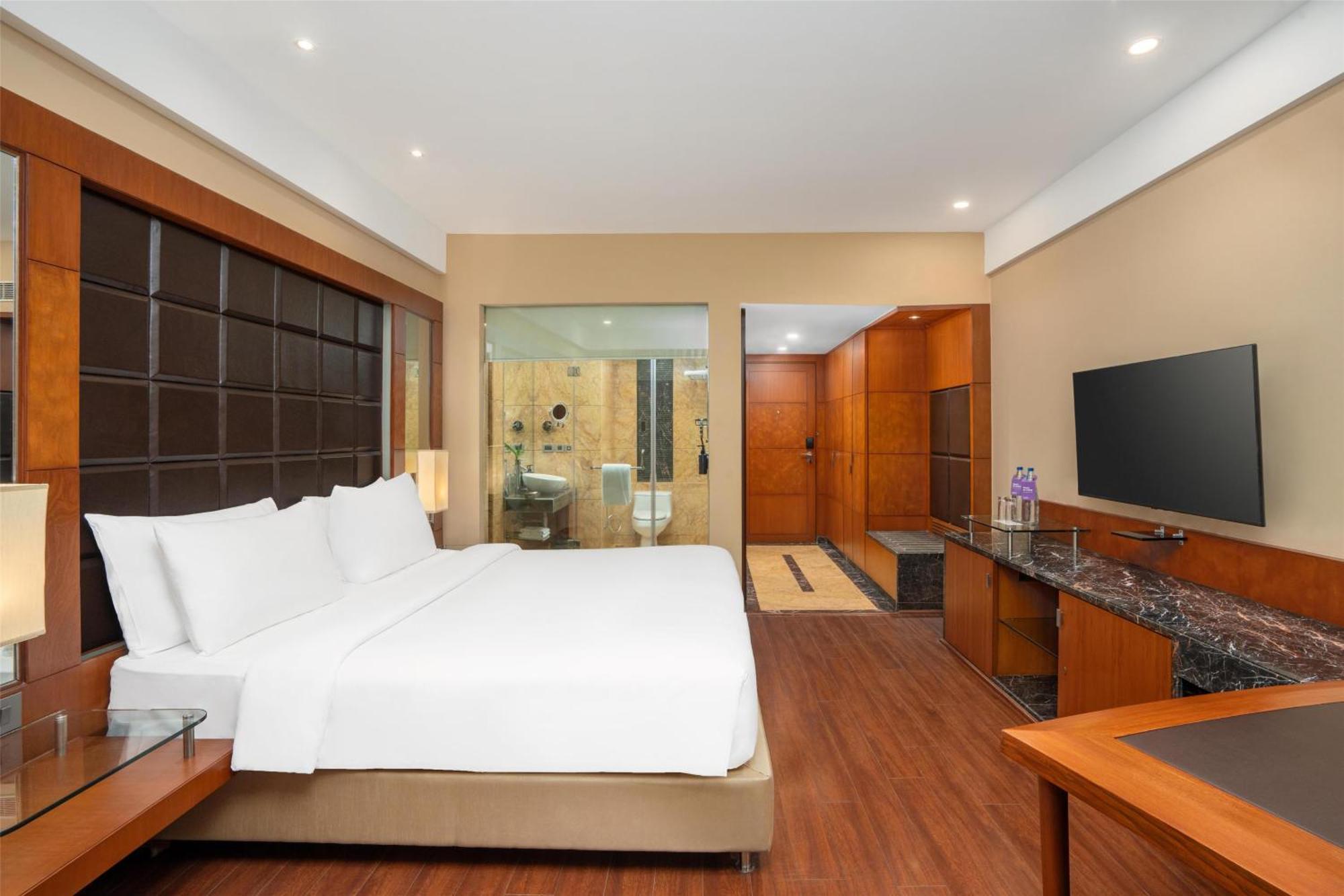 Deluxe Room Happy Hours 0100 PM to 0600 PM Pick up drop to Worldmark Aerocity subject to car availability