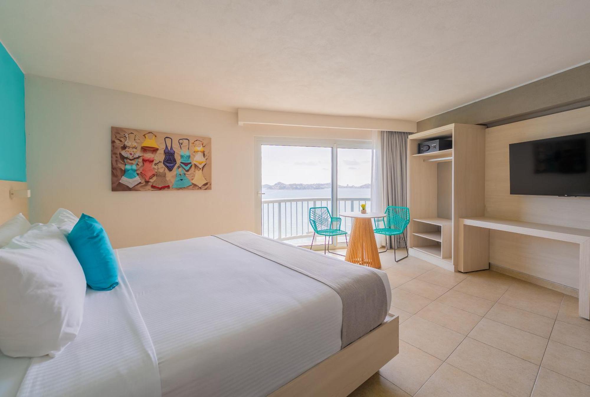 Habitación Superior con vistas al mar y cama extragrande