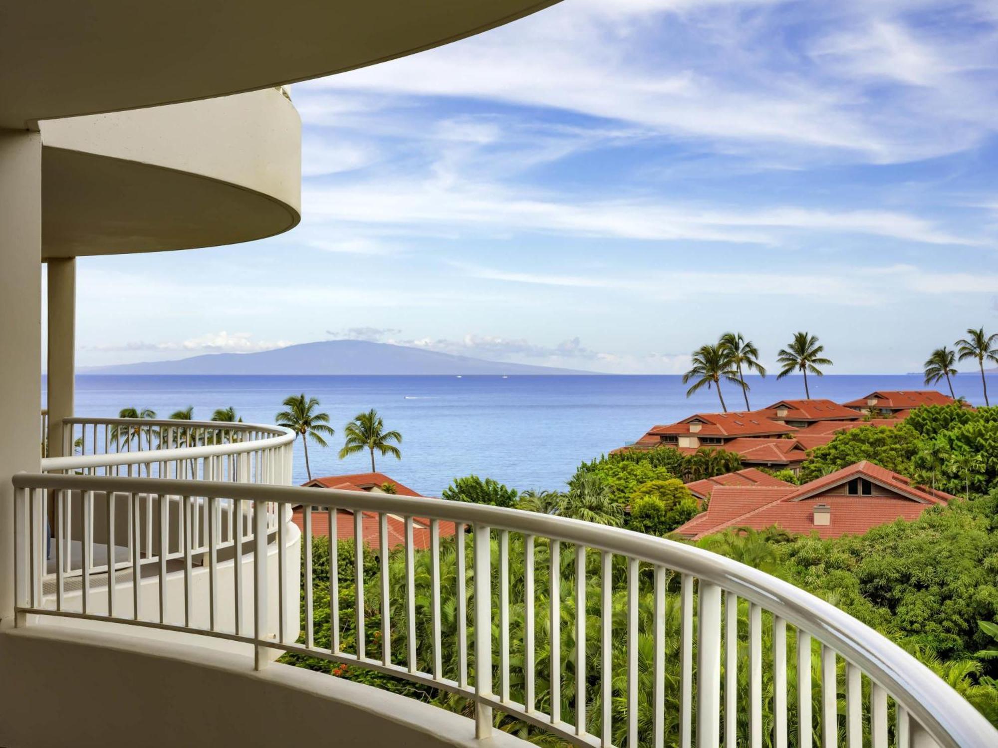 King Suite with Sofa Bed and Partial Ocean View