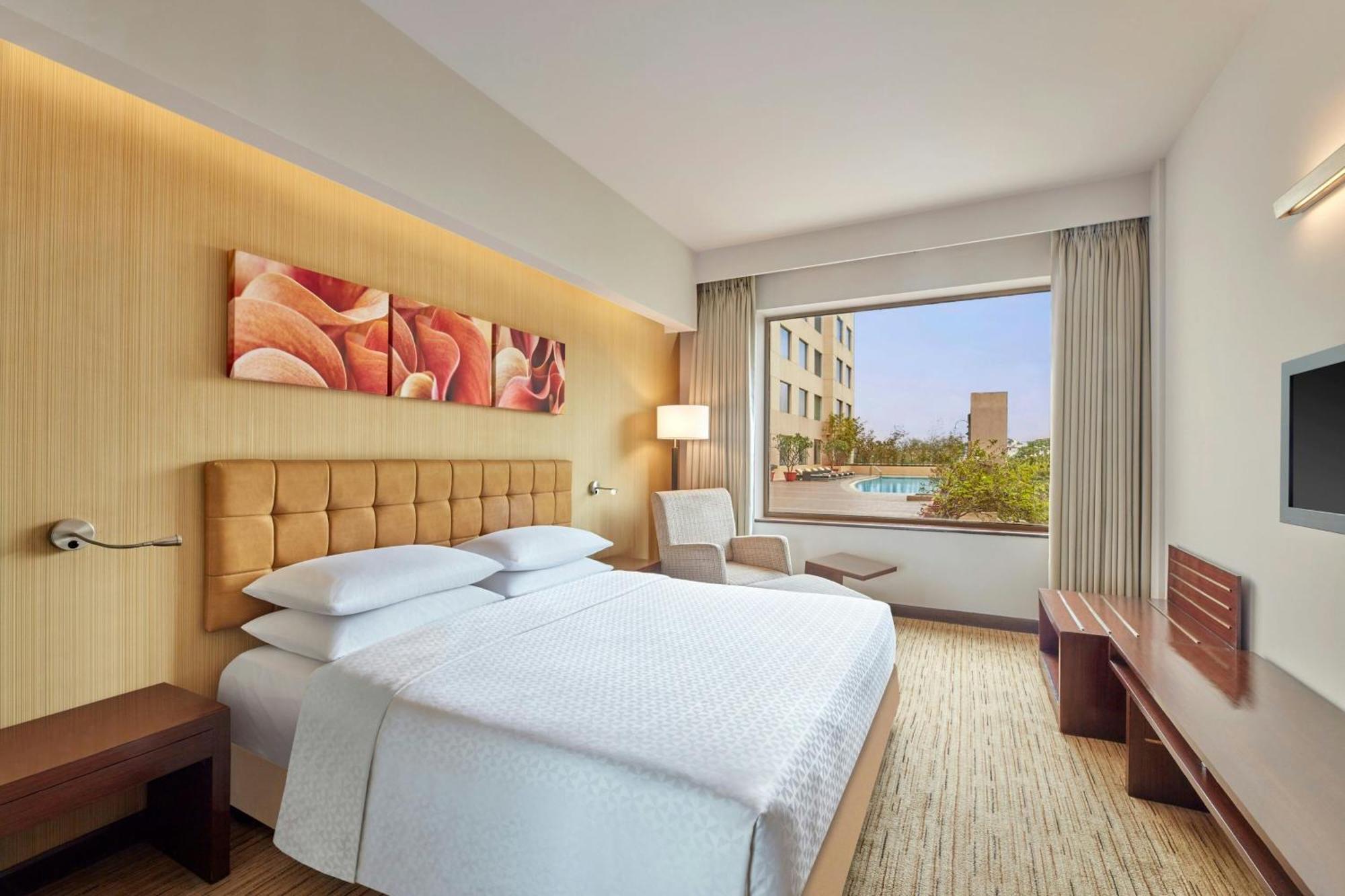 650 sqft Bedroom Apartment Kitchenette on Food & Soft Beverages Complimentary Lounge Access 2 IMFL drinks & snack buffet during 1800 to 2000 hrs