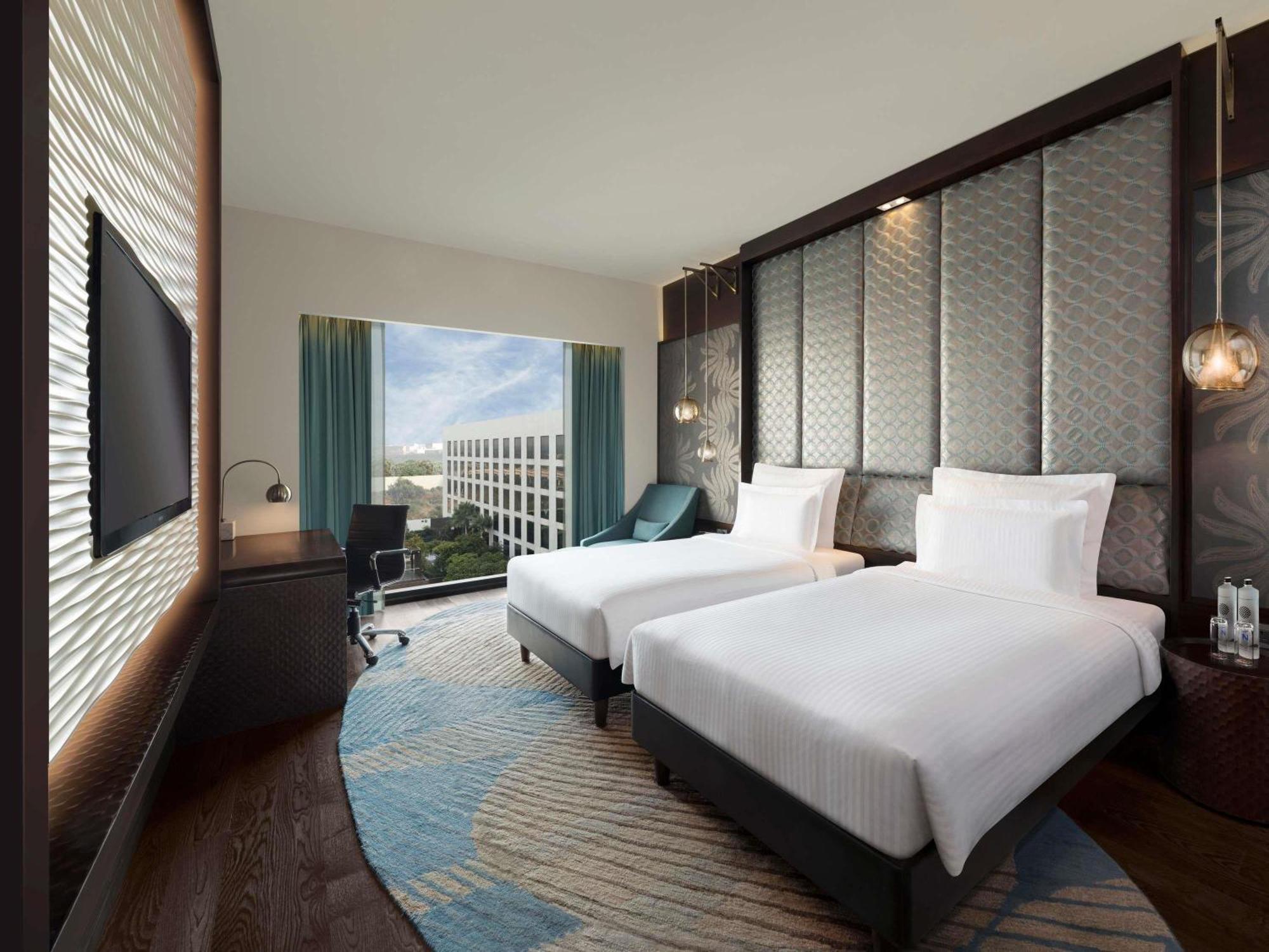 Executive Twin Room City Side on food beverages spa laundry | Complimentary one way airport transfer | Lounge access cocktail hours