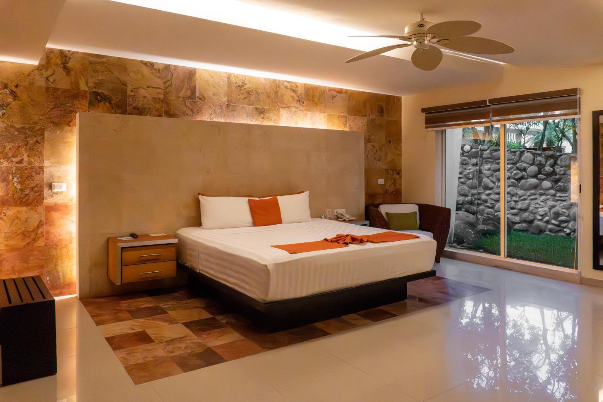 Suite Junior con vistas al jardín