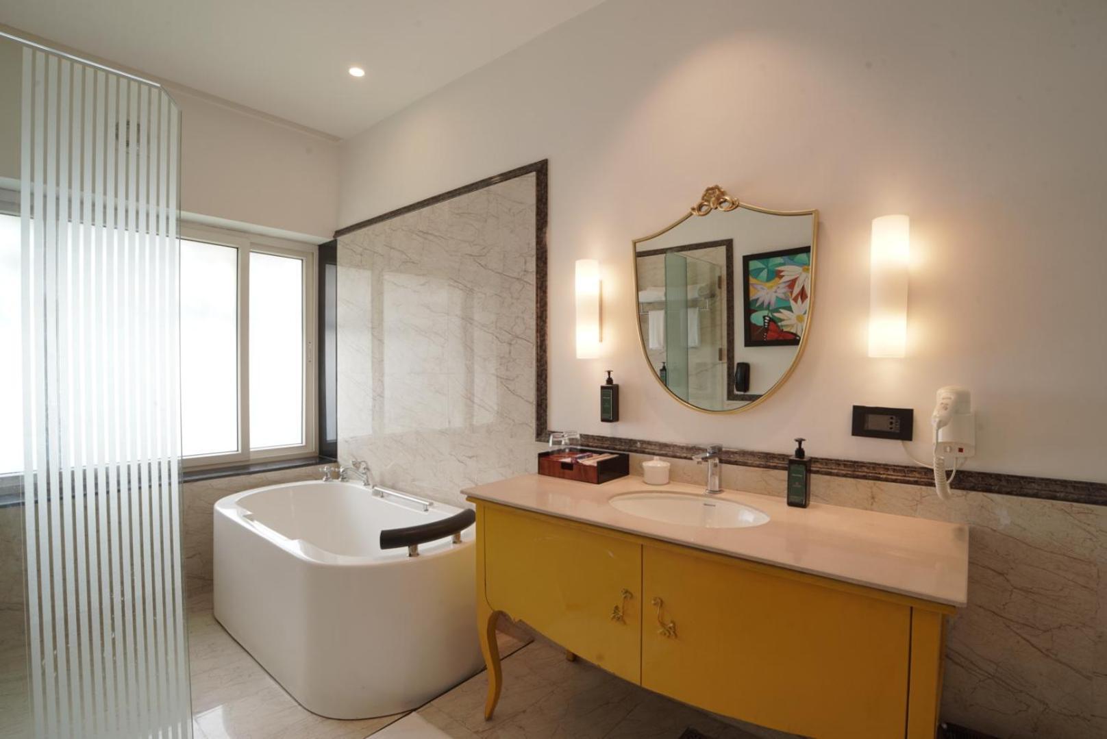 Premium Room Sea View Twin on Foods & Soft Beverages* | Discounts on Laundry Services* | INR 500 spa credit during your on selective Massage services TnC Apply* | Minibar 2 cans of soft Beverages Once on Arrival