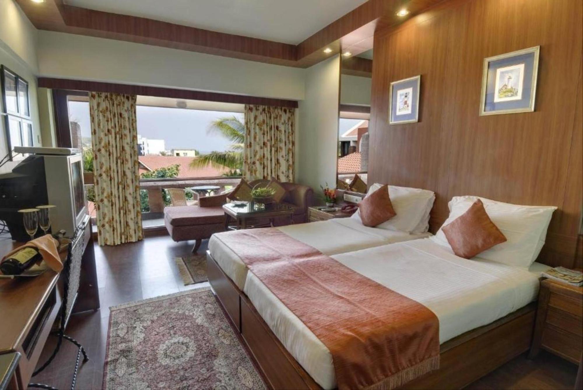 Premium Room Sea View Twin on Foods & Soft Beverages* | Discounts on Laundry Services* | INR 500 spa credit during your on selective Massage services TnC Apply* | Minibar 2 cans of soft Beverages Once on Arrival