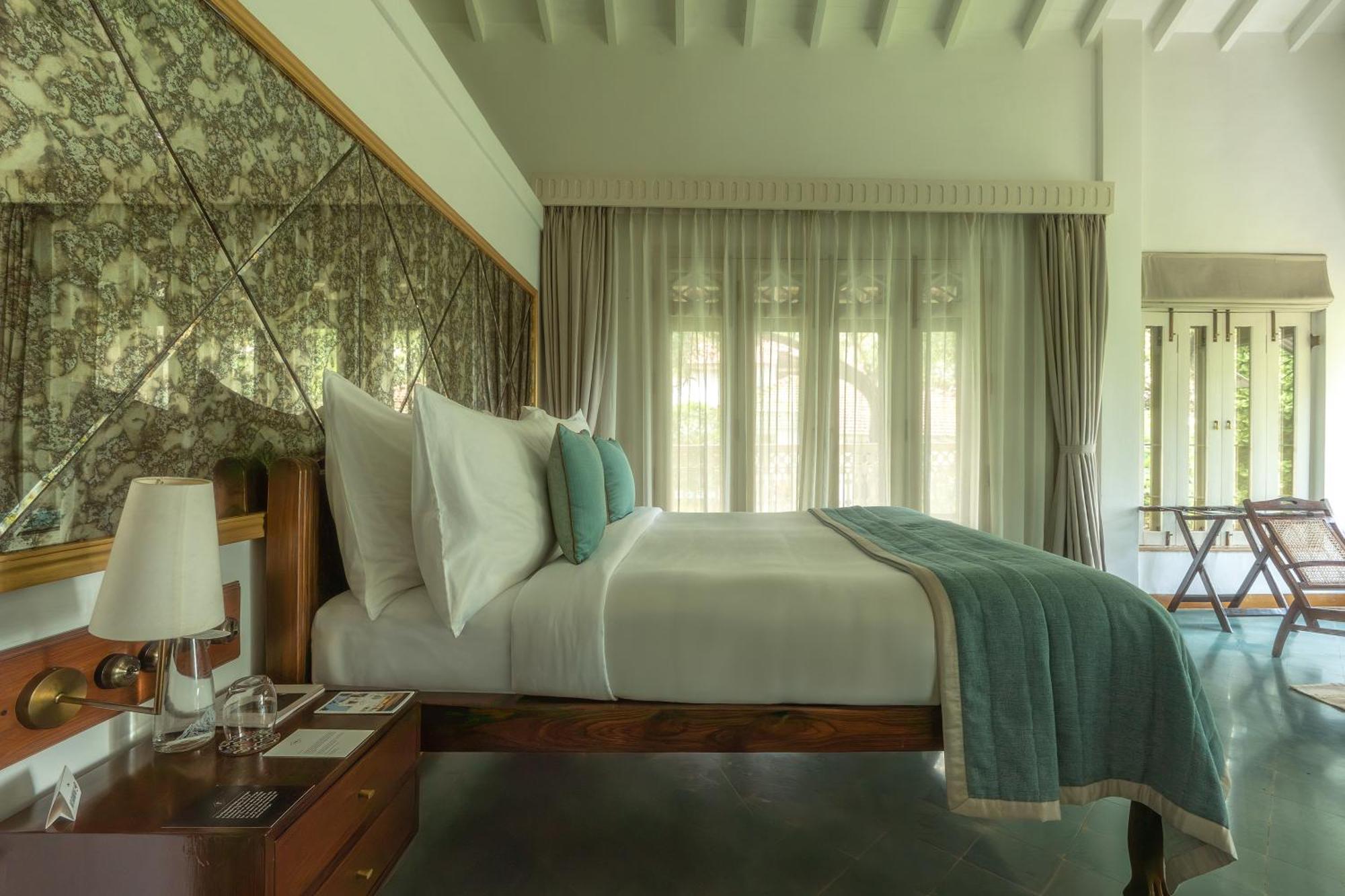 Mandovi River View Room Two personalised Ayurvedic therapies Restorative yoga sessions Private consultations our doctors