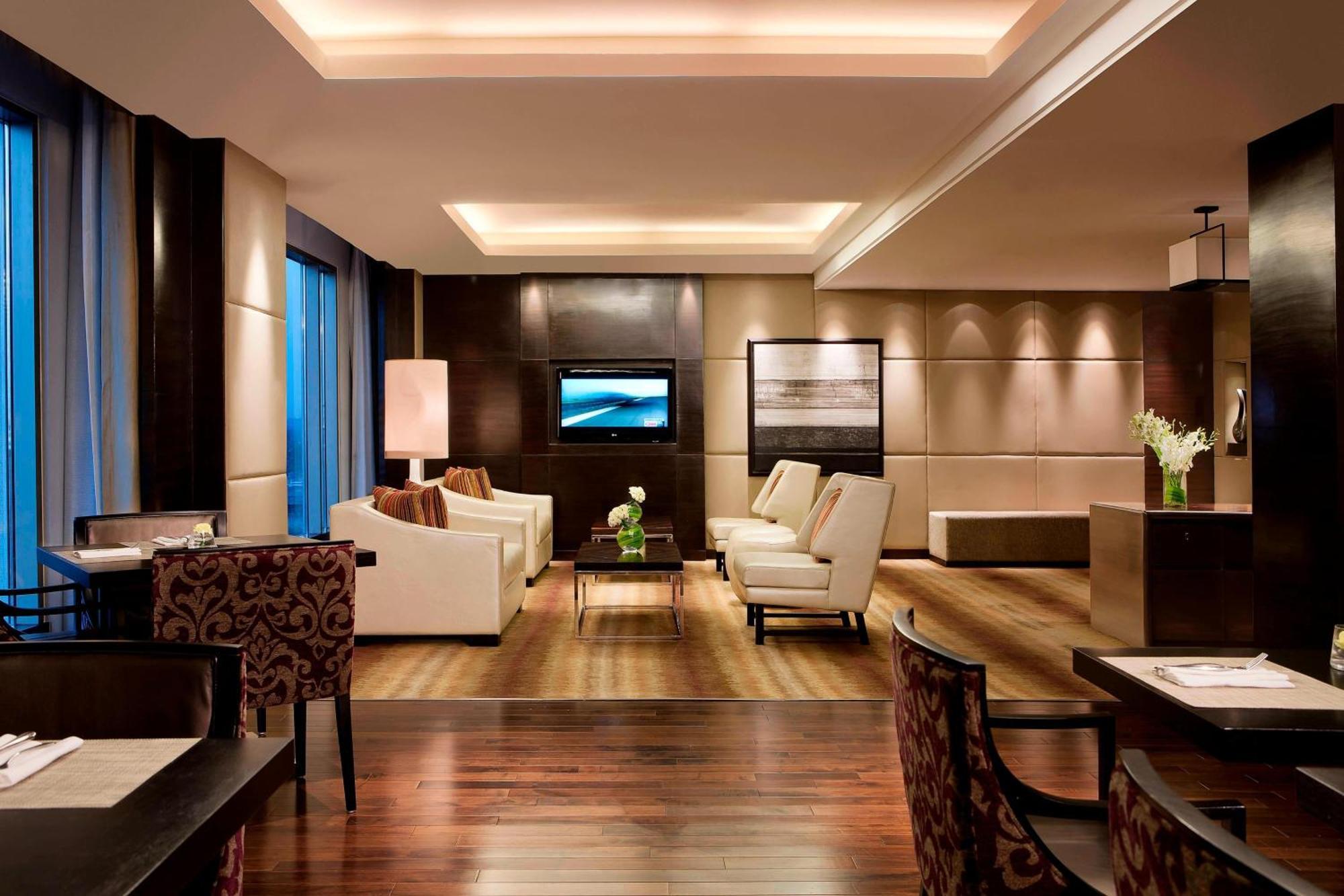 Executive King Room complimentary & Club access unlimited IMFL Beverages 5PM to 7PM F&B at JW Café Saffron XO