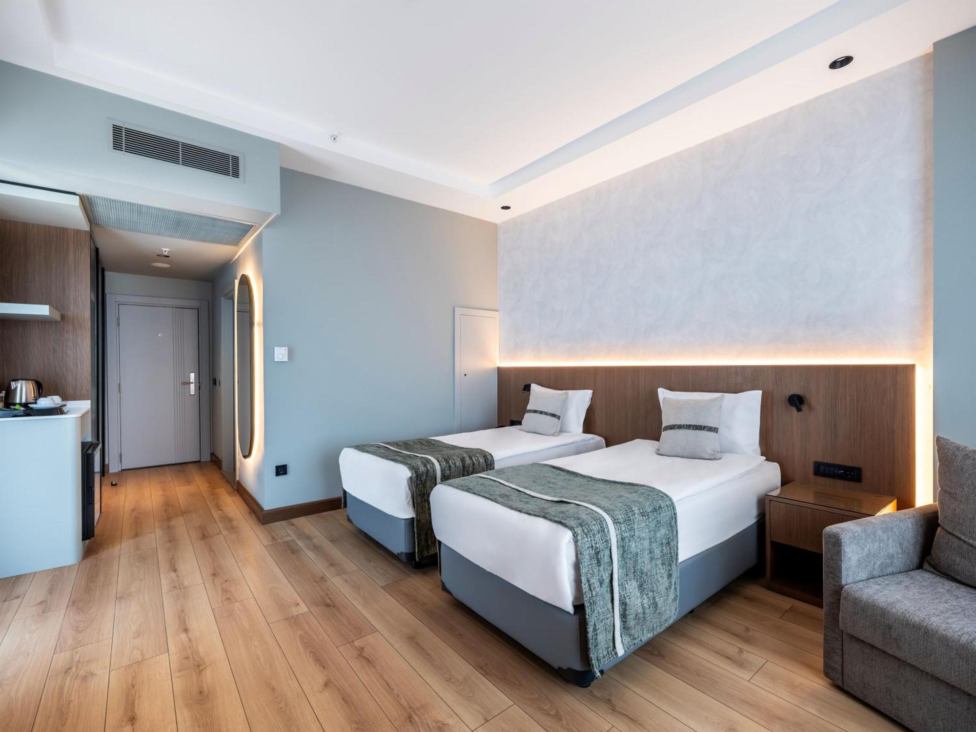 Dreibettzimmer mit Meerblick