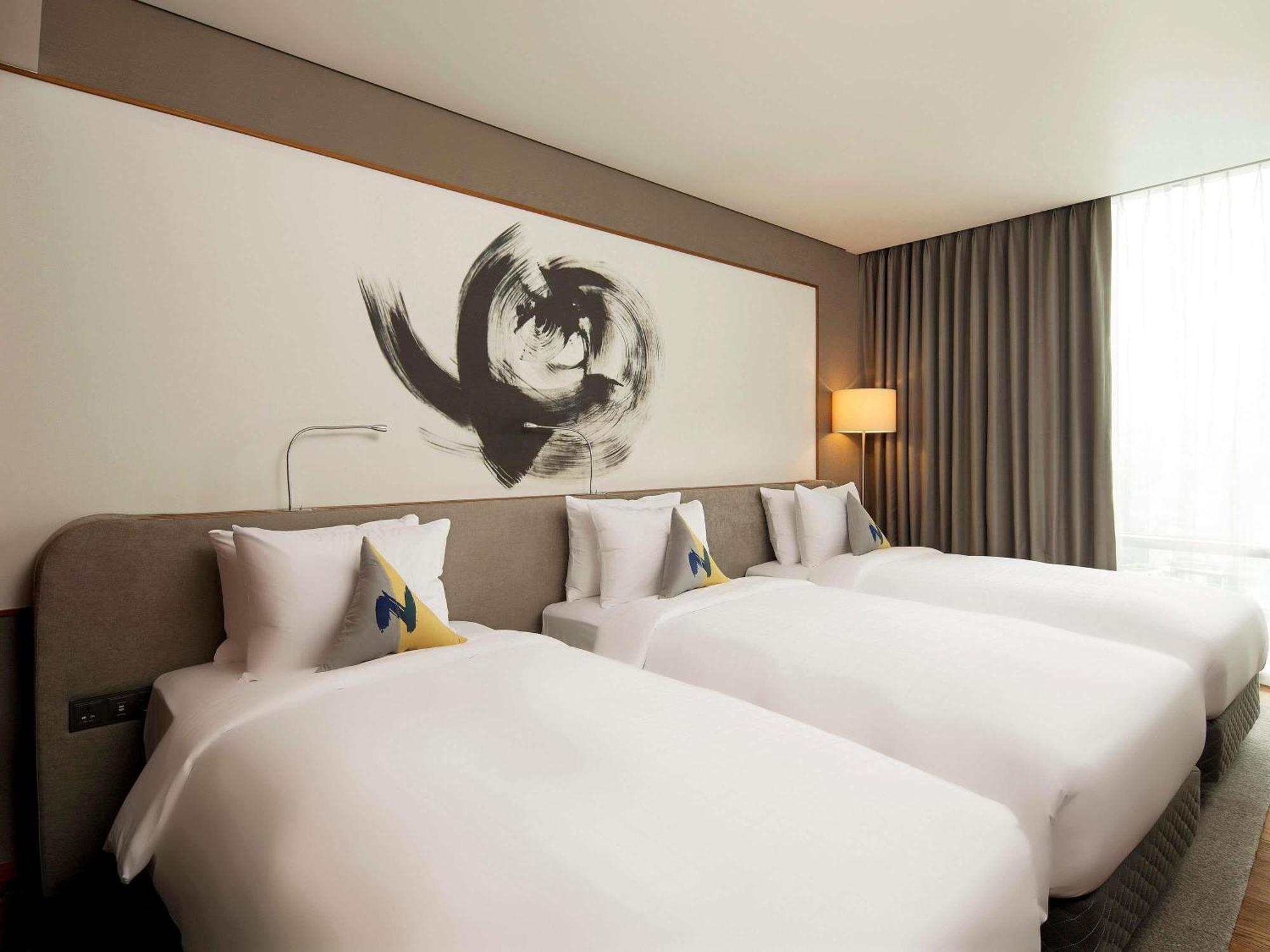 Superior Dreibettzimmer mit 3 Einzelbetten