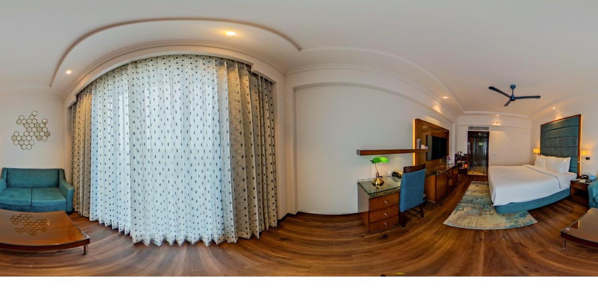 Standard Room Enjoy Happy Hours 11 on Beverages 12 PM-6 PM Except Dragon House on Spa Laundry service INR 500 credit on buffet at Mosaic Restaurant