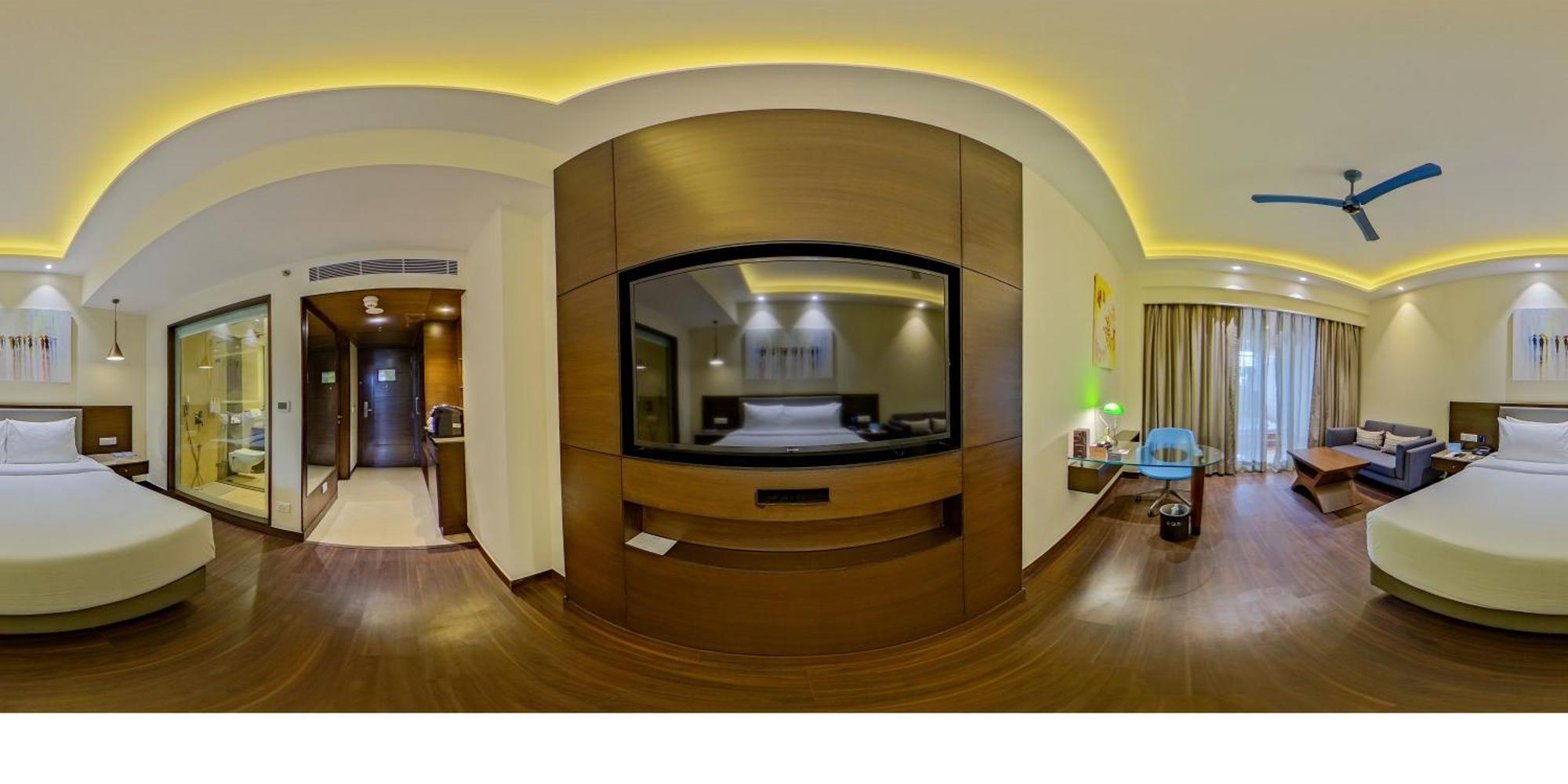 Junior Suite 1 Way Airport Transfer on SPA laundry INR 500 F&B credit on Fruit basket on the of arrival 4 pcs of Laundry or room or 2 pints of house beer once during stayINR 500 credit on buffet at Mosaic Restaurant