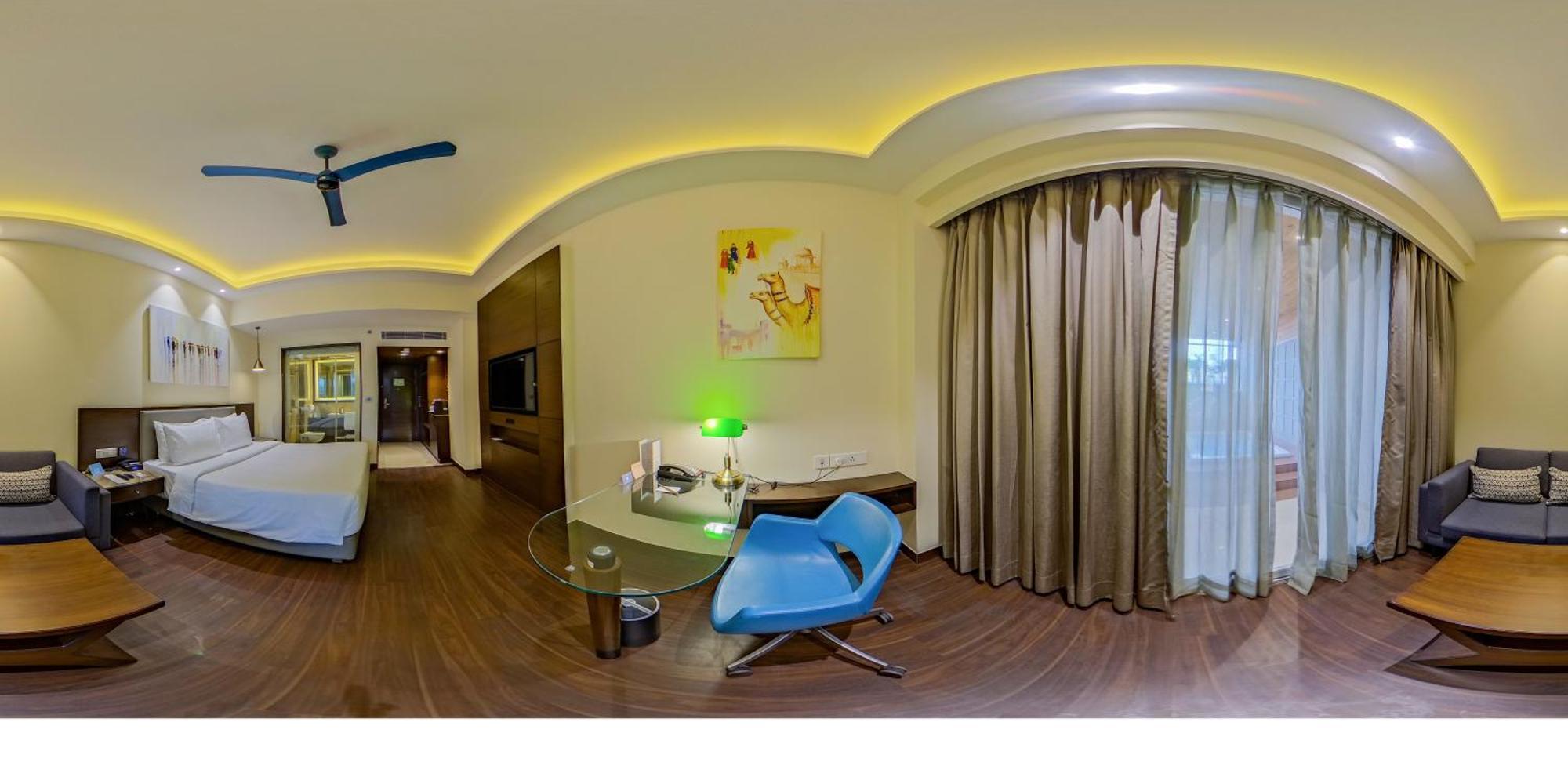 Junior Suite 1 Way Airport Transfer on SPA laundry INR 500 F&B credit on Fruit basket on the of arrival 4 pcs of Laundry or room or 2 pints of house beer once during stayINR 500 credit on buffet at Mosaic Restaurant