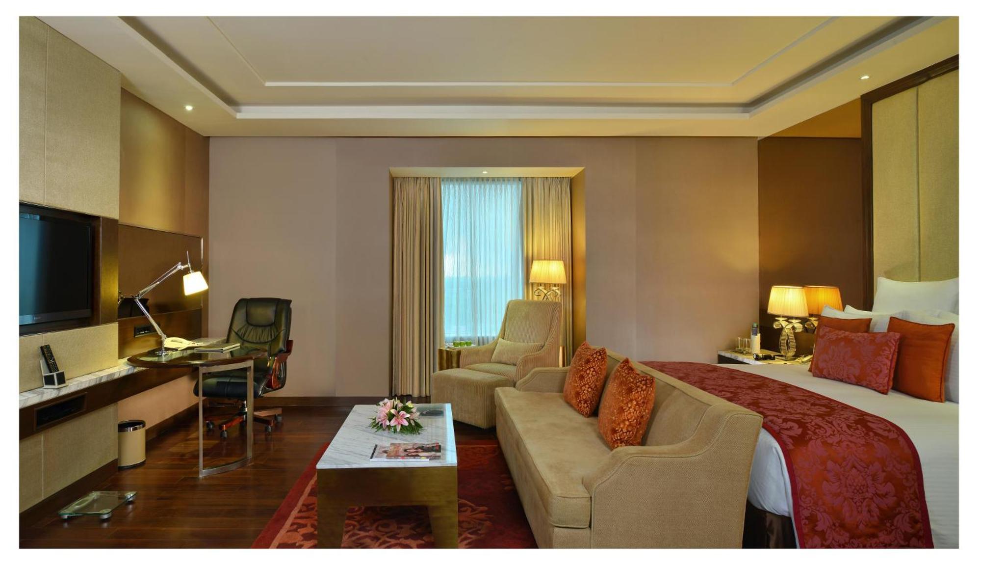 Junior Suite Bathtub Non Smoking Room 02 beer or 02 PegsIMFL or 02 Mocktails 02 pcs laundry Complimentary INR 500 Hotel Credit on min usage of INR 2000 at market place restaurant on Food & Soft Beverages on Mini Bar,807904614:JPEG