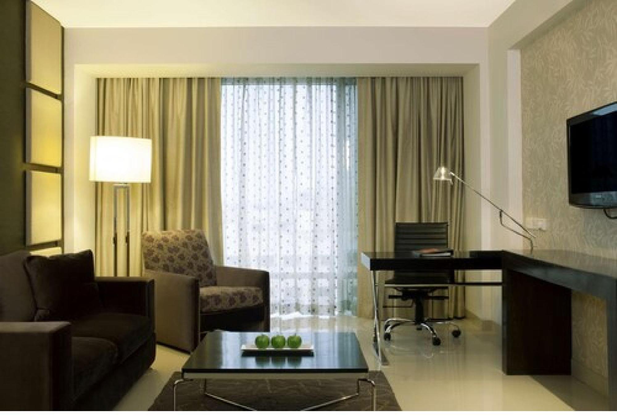 Junior Suite with Complimentary 2 IMFL Drinks , 2 Pieces of Laundry per stay and 20% discount on Spa.,555059202:JPEG