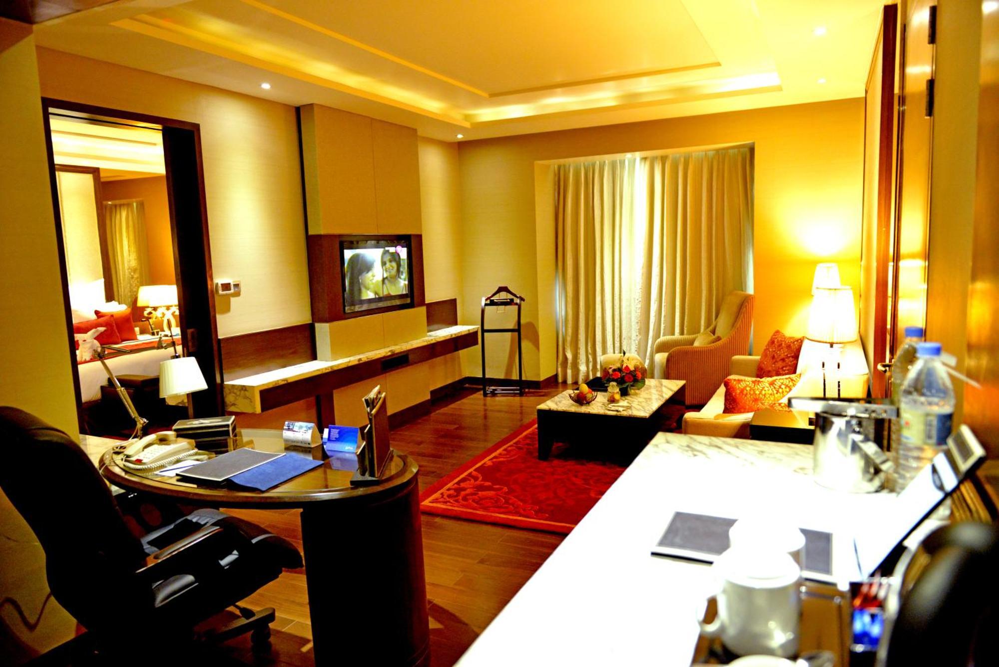 Suite Bathtub Living Room Non Smoking Room 02 beer or 02 PegsIMFL or 02 Mocktails 02 pcs laundry Complimentary INR 500 Hotel Credit on min usage of INR 2000 at market place restaurant on Food & Soft Beverages on Mini B,893500648:JPEG