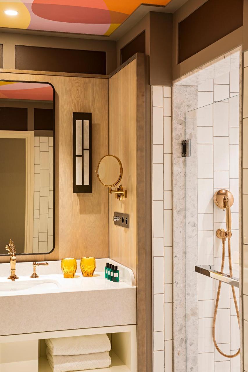 Junior King Suite with One King Bed/One Sofa Bed and Living Room - Courtyard or Rue Scribe View,776177284:JPEG