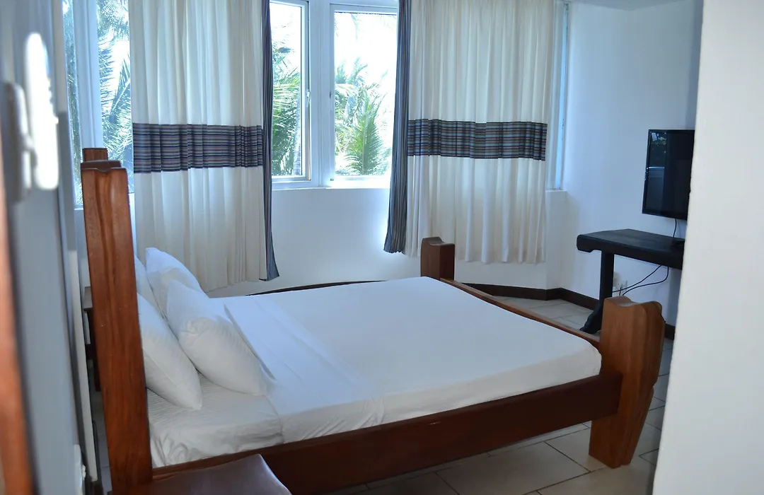 Cowrie Shell Beach Apartments Official-1